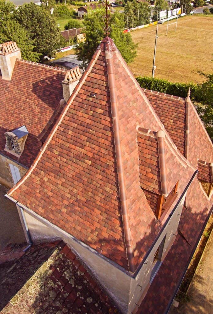 Edilians French Shingle Tile Used On A Turret. Tile Looks Old And Weathered The Day It Goes On.