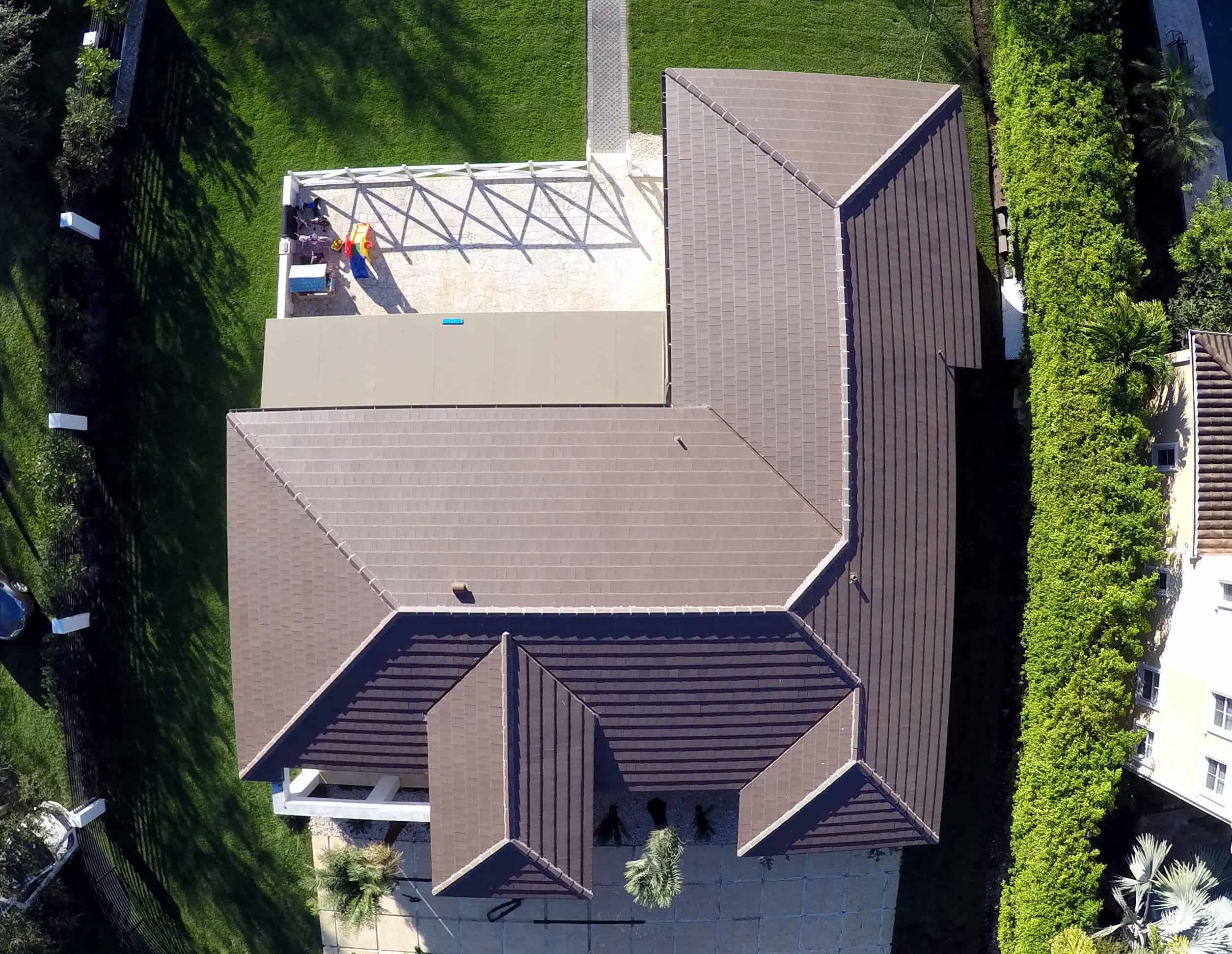 Looking Down From A Drone on a Modern House Using Verea Flat Interlocking Tile in Graphite