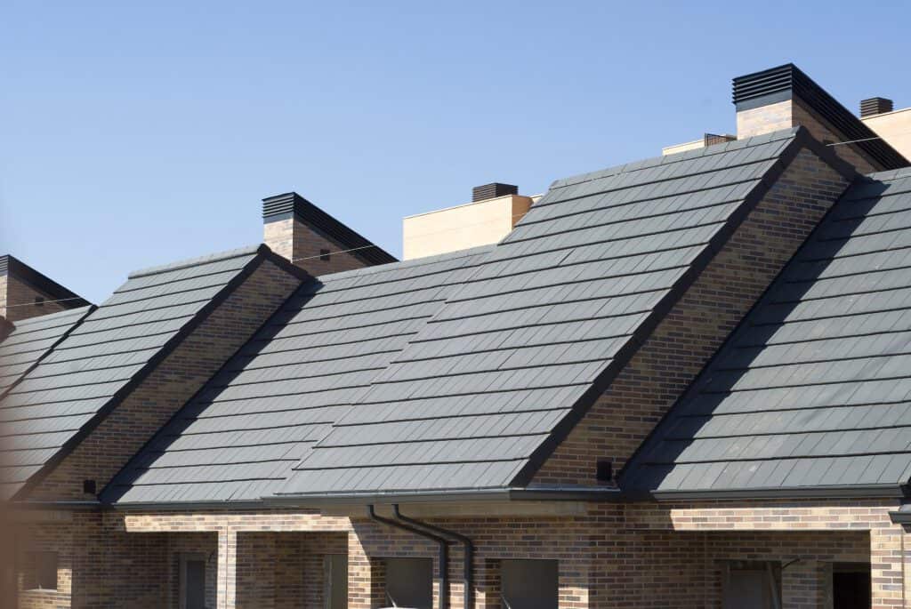 Modern Style Roof using Plana Flat Clay Roof Tiles In Ebony Gray