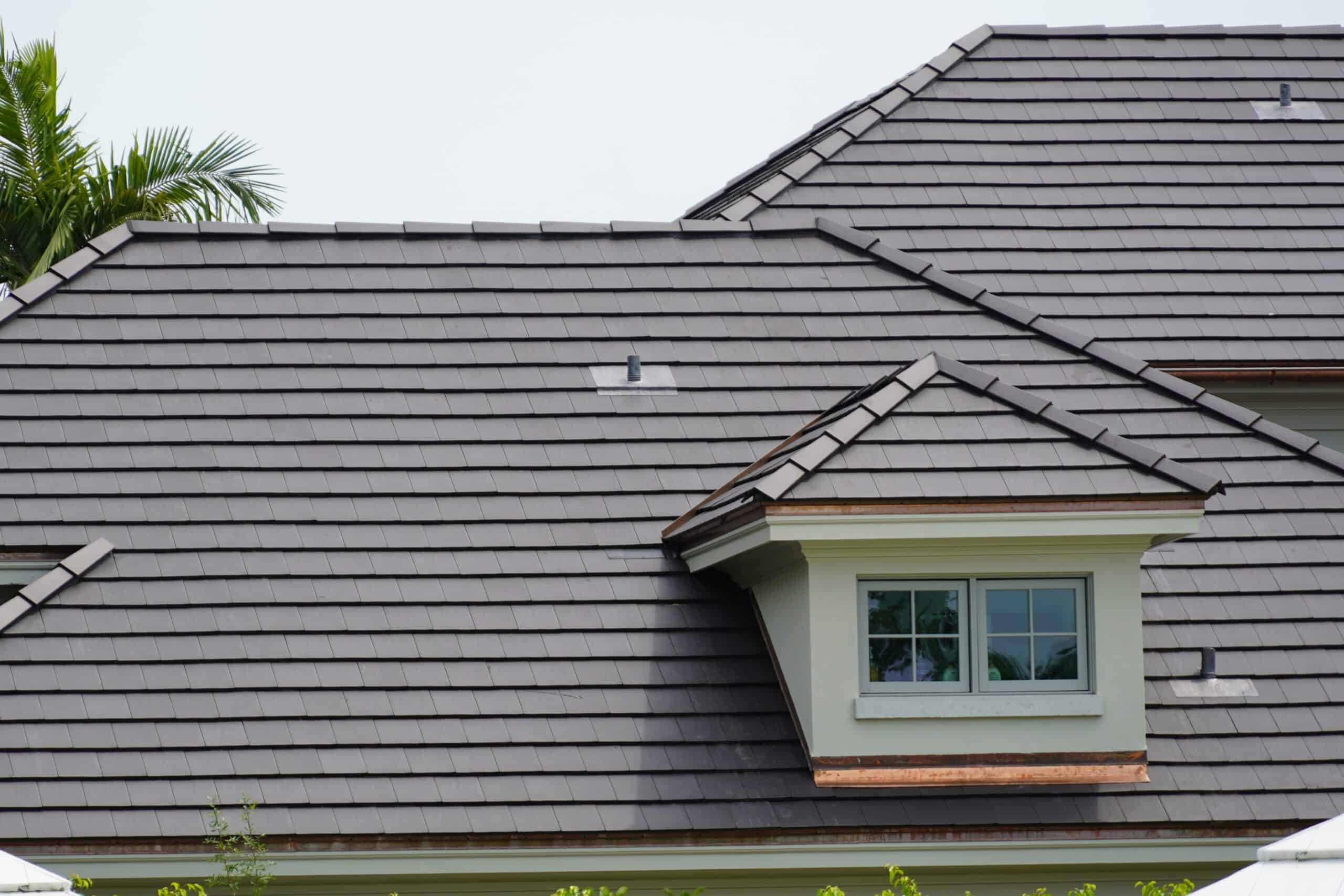House Using Verea Flat Clay Roof Tiles in Slate Color