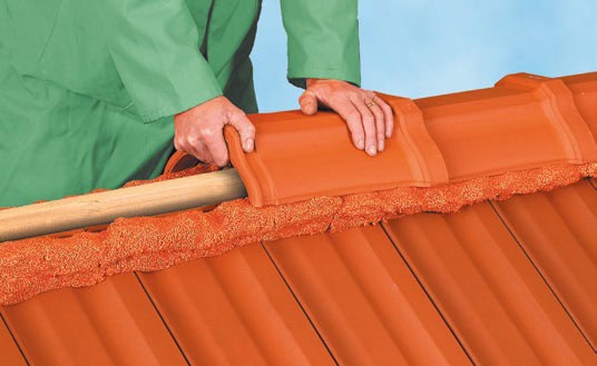 Press The Ridge Tile Into The Flexim Roof Mortar For A Good Seal