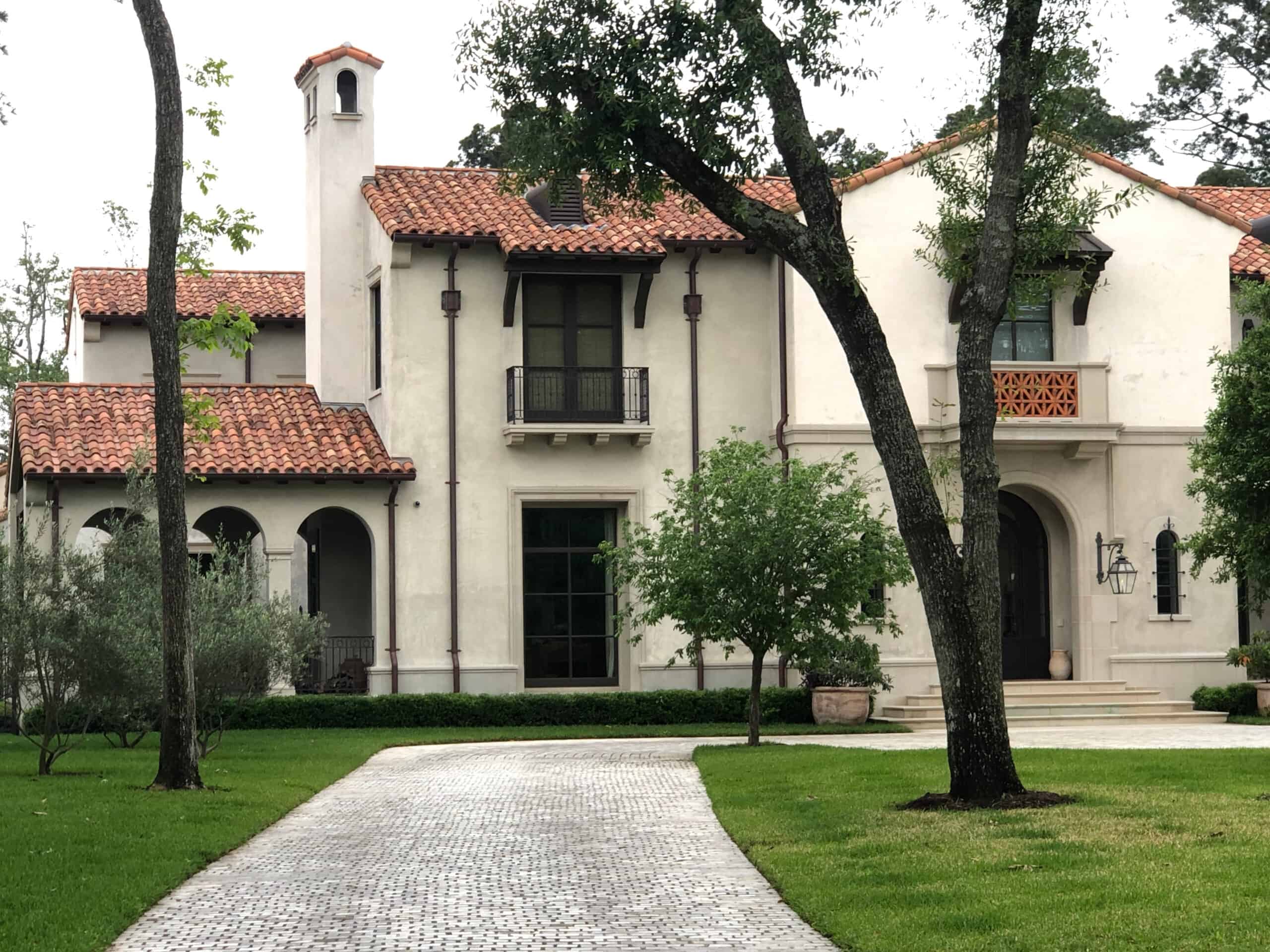 Castilla tiles in action—deep texture and natural kiln flashing add warmth to this Mediterranean-inspired home. Castilla Sunset blend