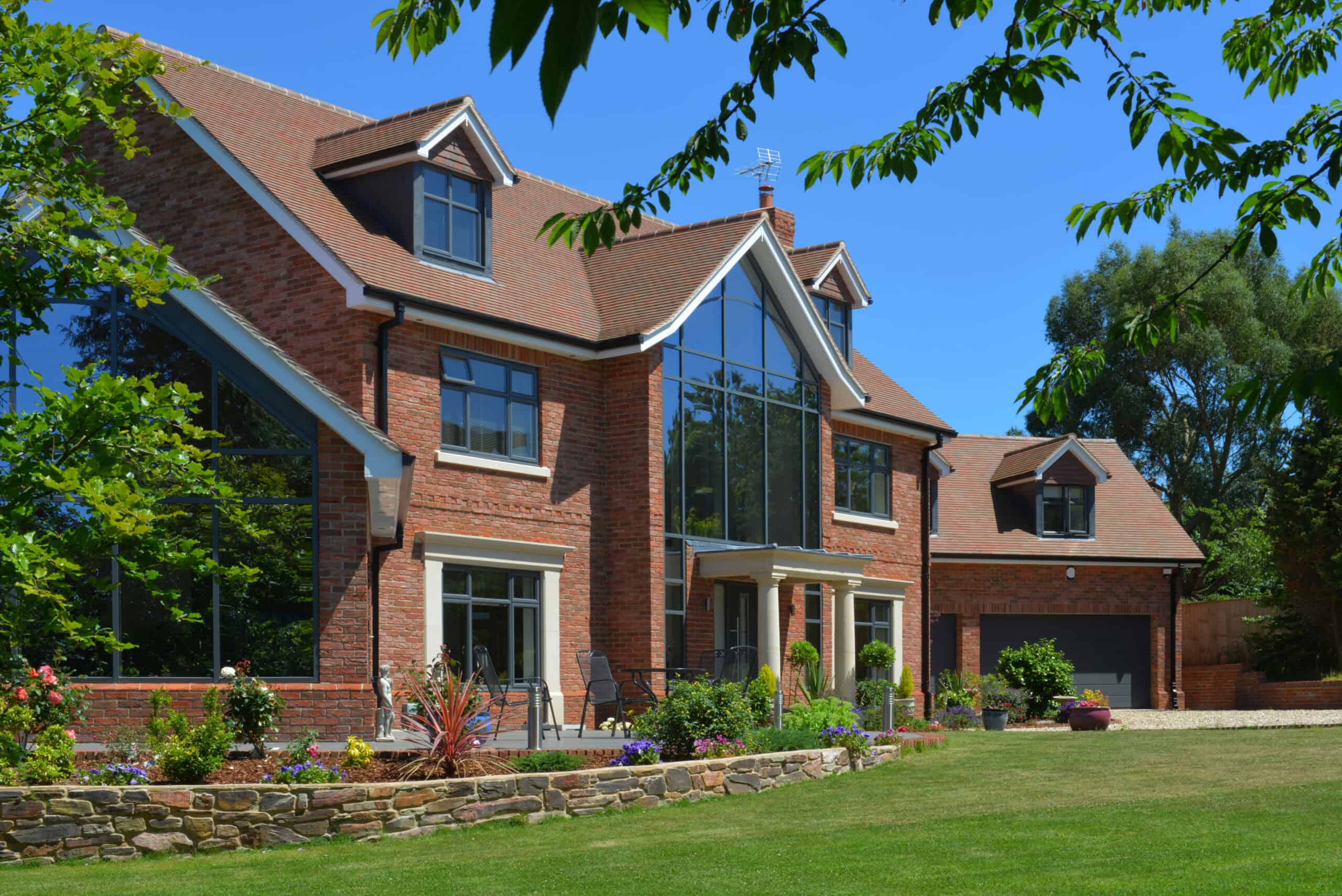 Country Brown Clay Roof Tiles on Traditional Brick Home