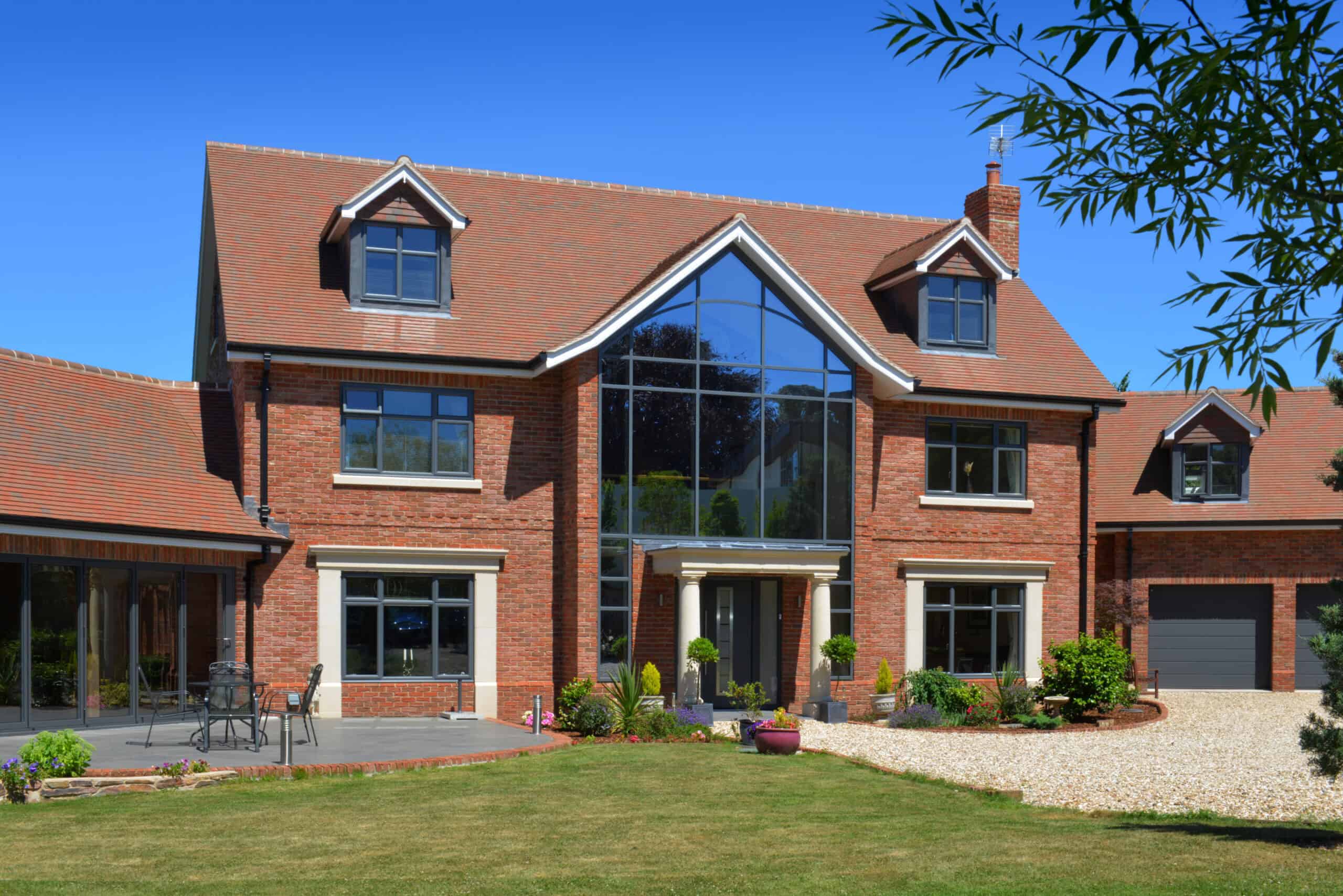 Country Brown Clay Roof Tiles on Modern Brick House